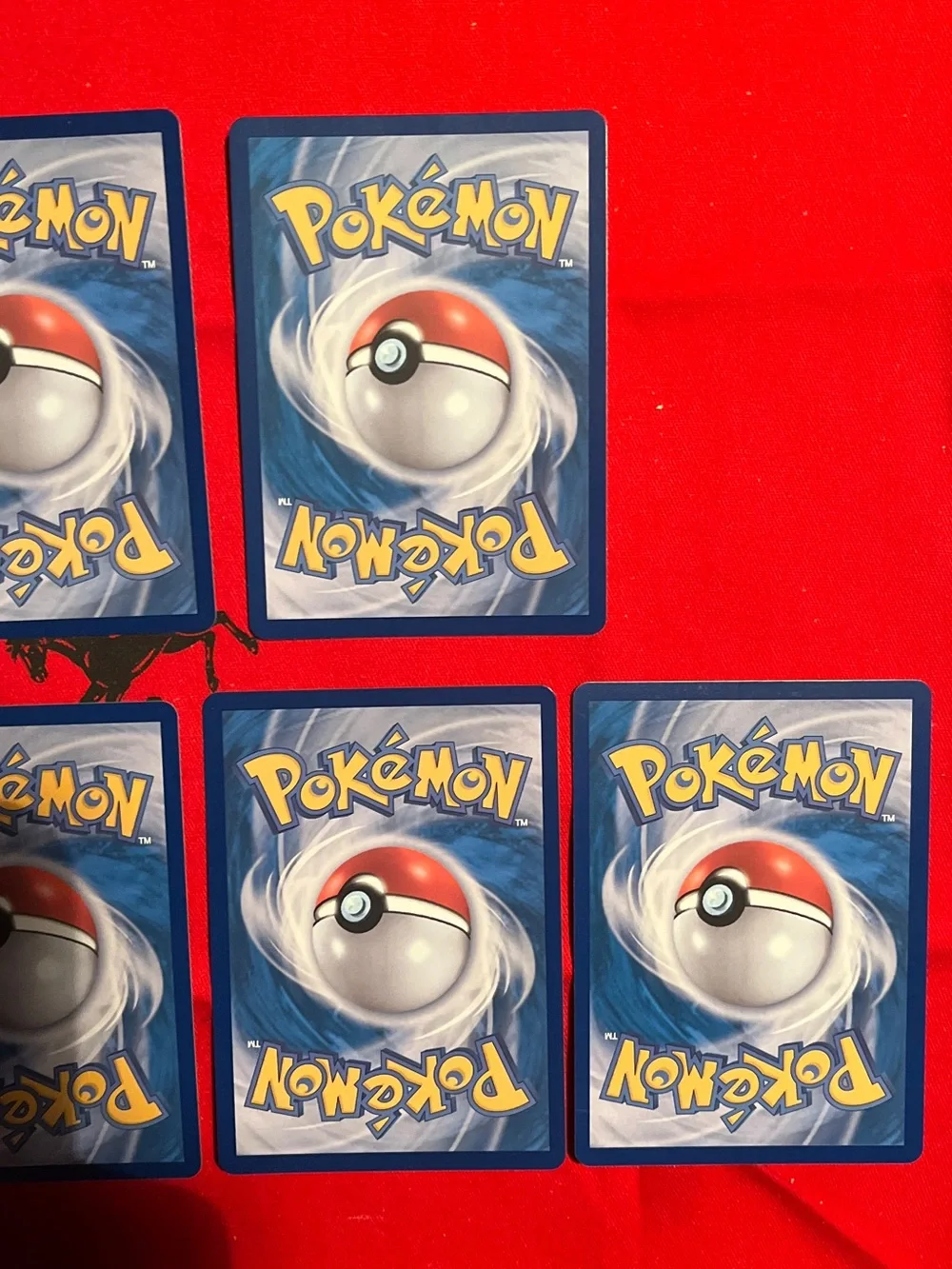 Pokemon Trading Card Lot with Red, Orange, Green, Black and Gold Holo Cards